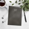 Business A5 sidottu musta 2027 
